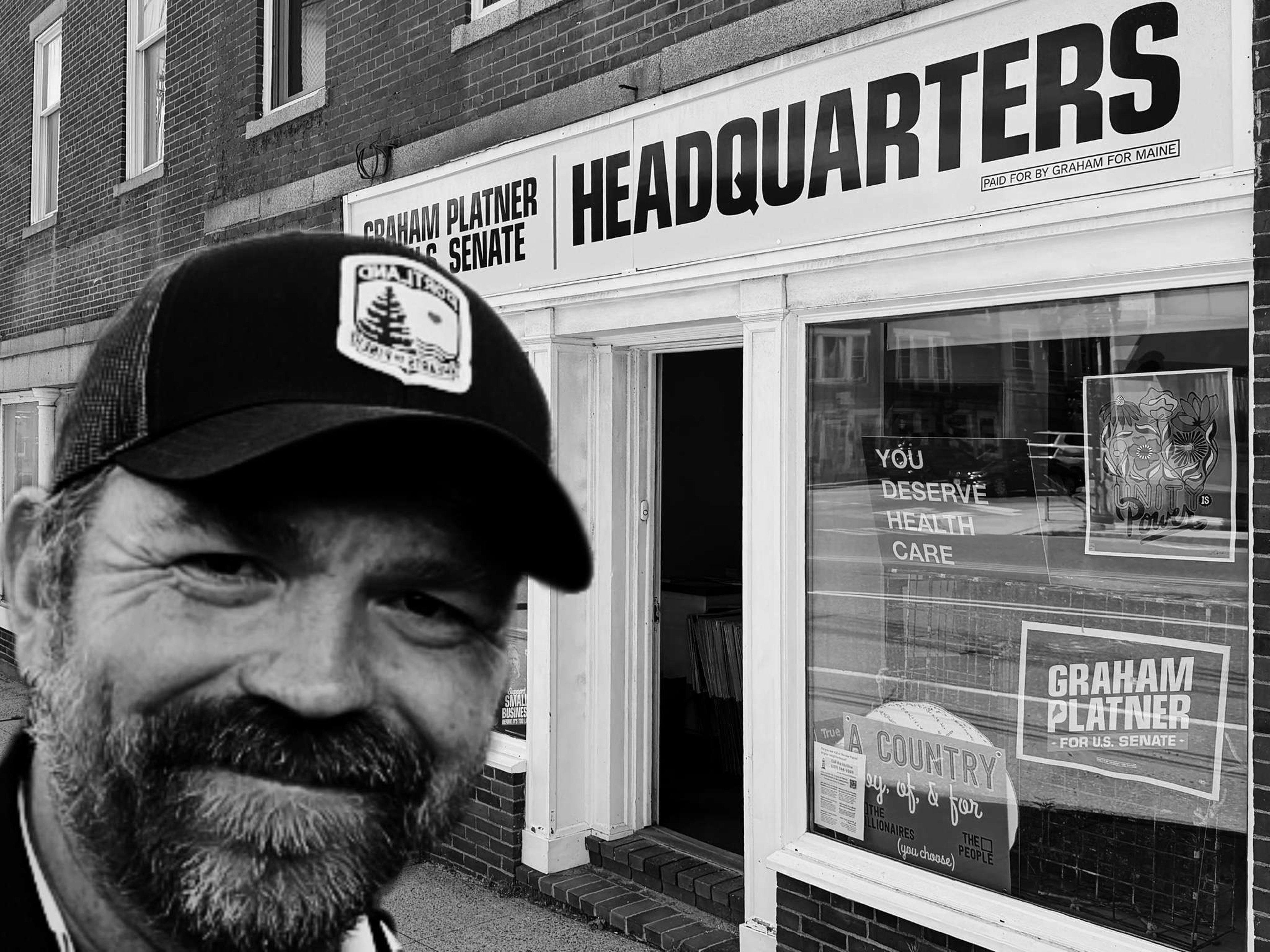 Graham Planter's face superimposed on a photo of his campaign headquarters